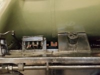 2017-03-10 11.59.14  Gravity oil feeds (middle) and the filler opening of the rear sanding box. On the left there is a control lever which runs to the middle of the front of the firebox. No idea whatfor, but it is disconnected. The rest of the lever can be seen dangling uselessly below the running board behind the feedwater pipe.